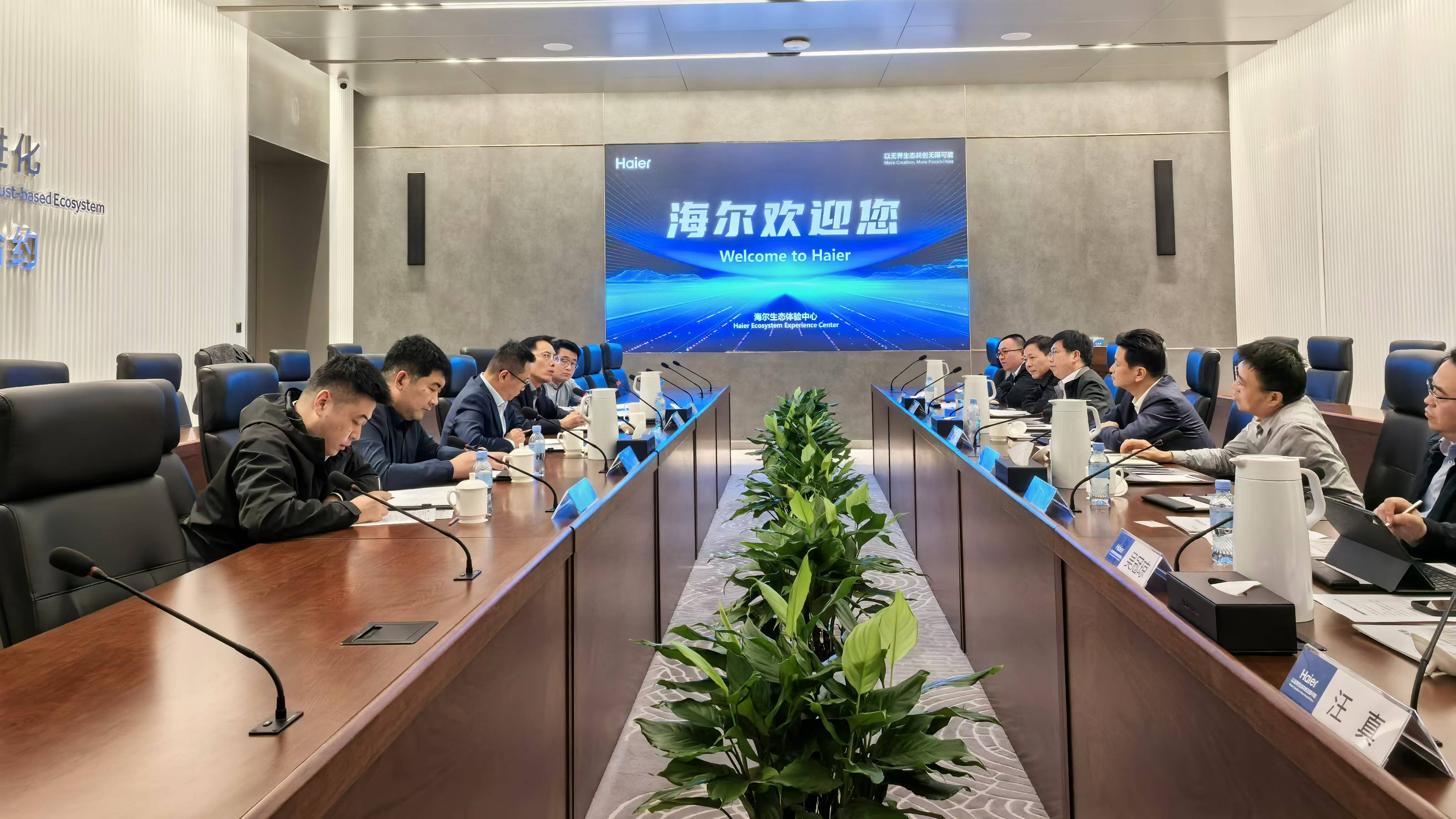 李明到海爾卡奧斯和特來電公司調研